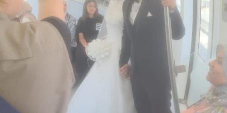 بالبلدي: عروسان
      يحتفلان
      بزفافهما
      على
      متن
      أحد
      قطارات
      المونوريل
      "صور"